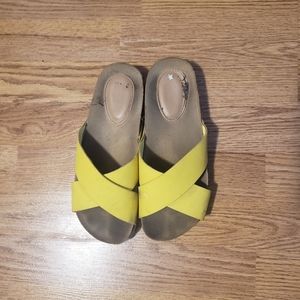 Yellow slip on sandals